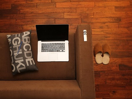Brown sofa and laptop